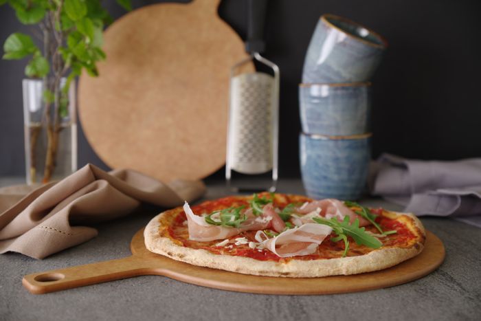 Planche à pizza avec poignée